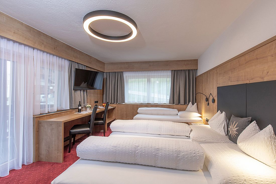 Dreibettzimmer